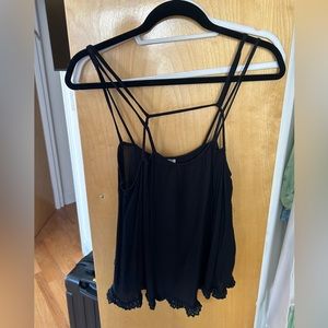 FREE PEOPLE tank top with ruffle bottom. Size SMALL. EXCELLENT CONDITION